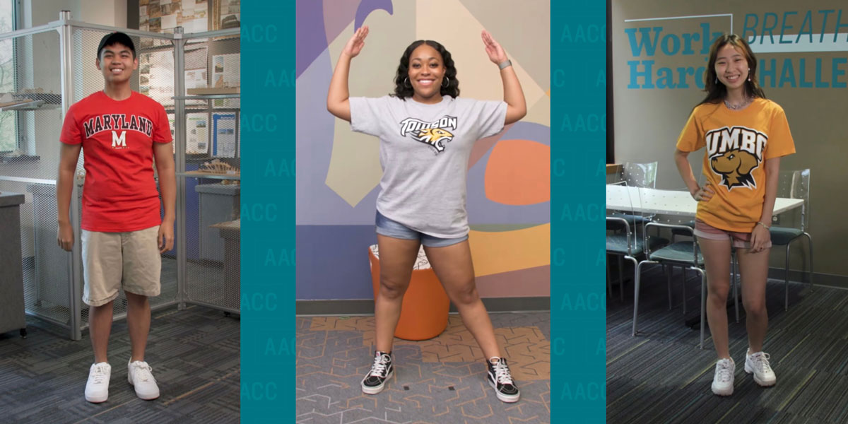 AACC students posing in a t-shirt with their transfer school of choice.