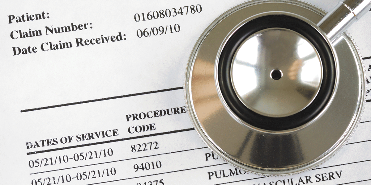 Stethoscope over medical records