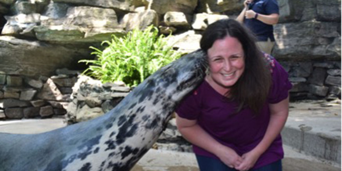Amy Carattini with a seal