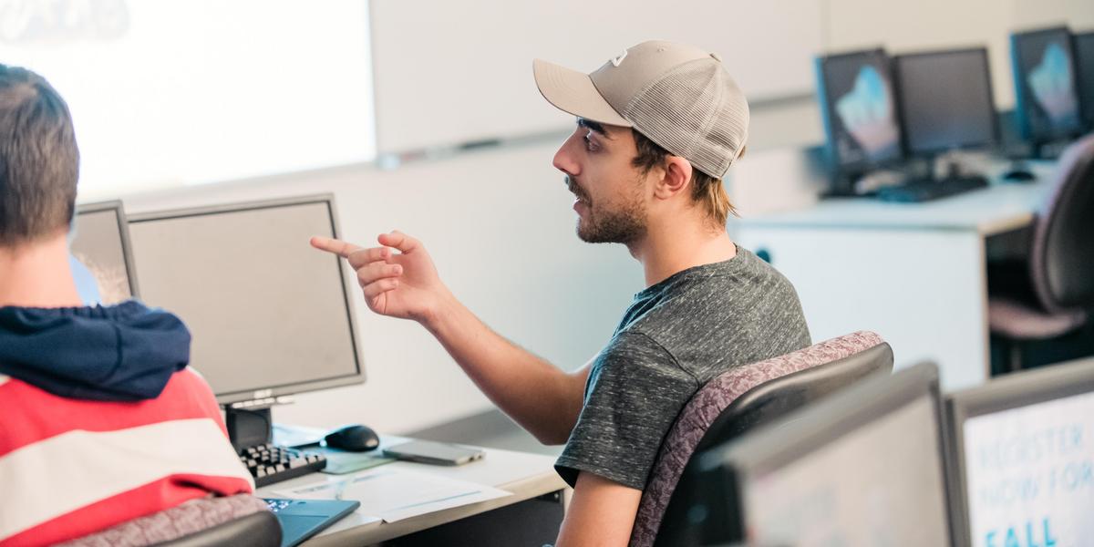 Student talking in entrepreneurship class.