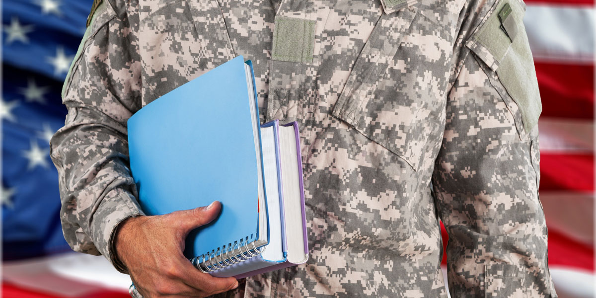 Military man in uniform with books.