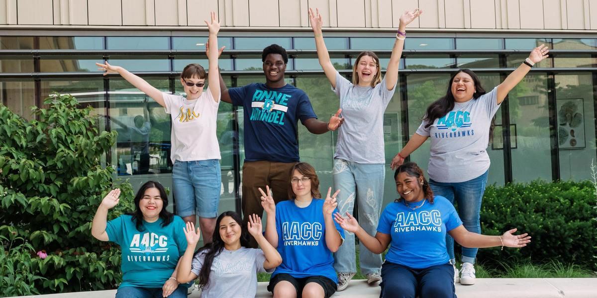 A group of students in AACC t-shirts