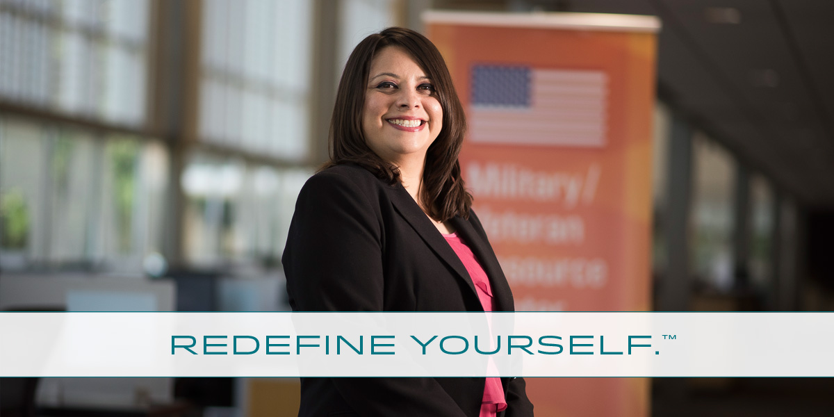 Redefine Francheska standing in front of patriotic banner.