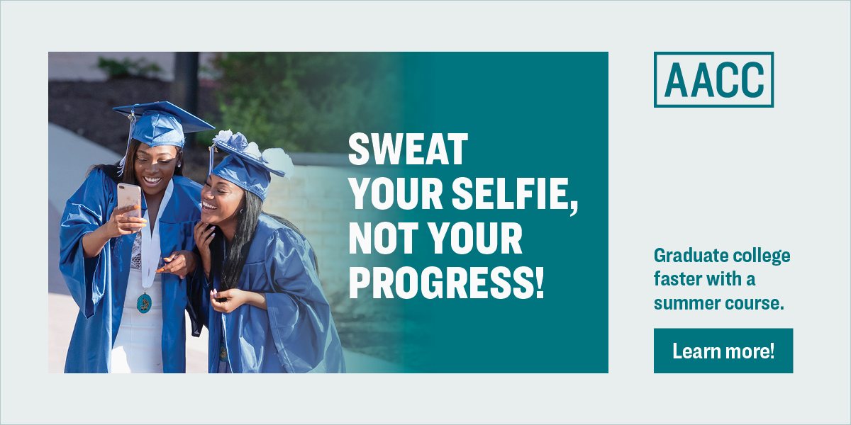Two students in graduation regalia posing for a selfie. Text that reads, 