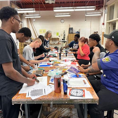 Students working on art project.