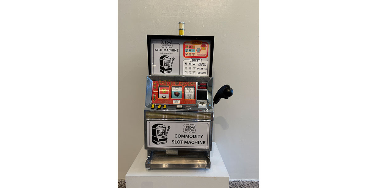 An old-fashioned slot machine titled USDA Certified Commodity Slot Machine.