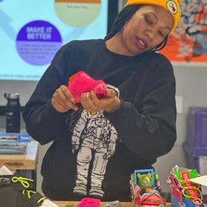 Student working on shoe project