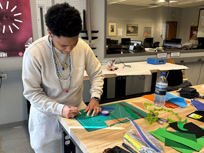 Student working on art project.