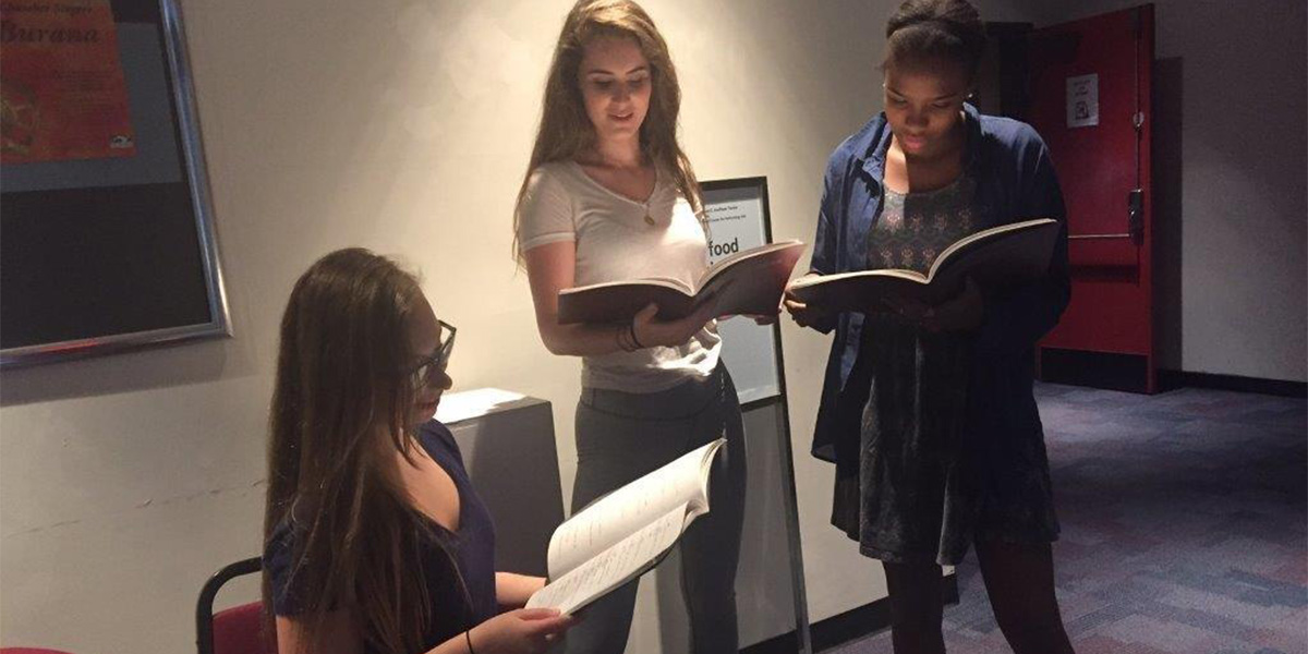 Students rehearsing a play