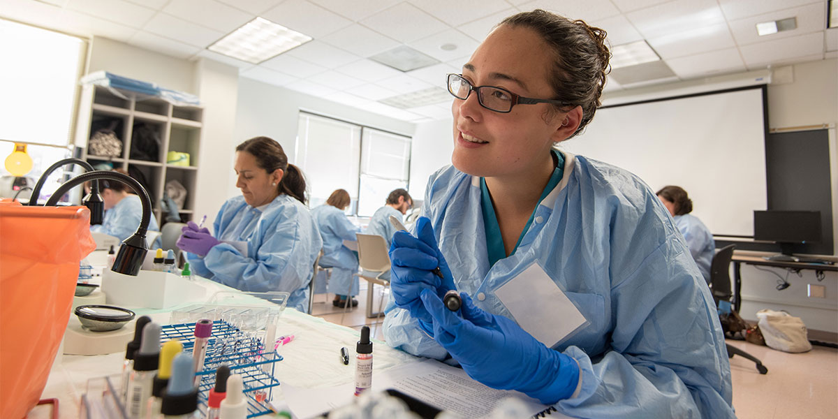 AACC student works in a medical lab classroom.