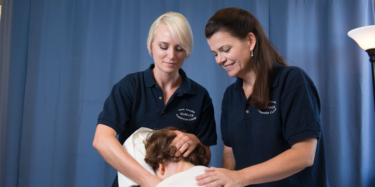 AACC Massage Therapy student learns from instructor.