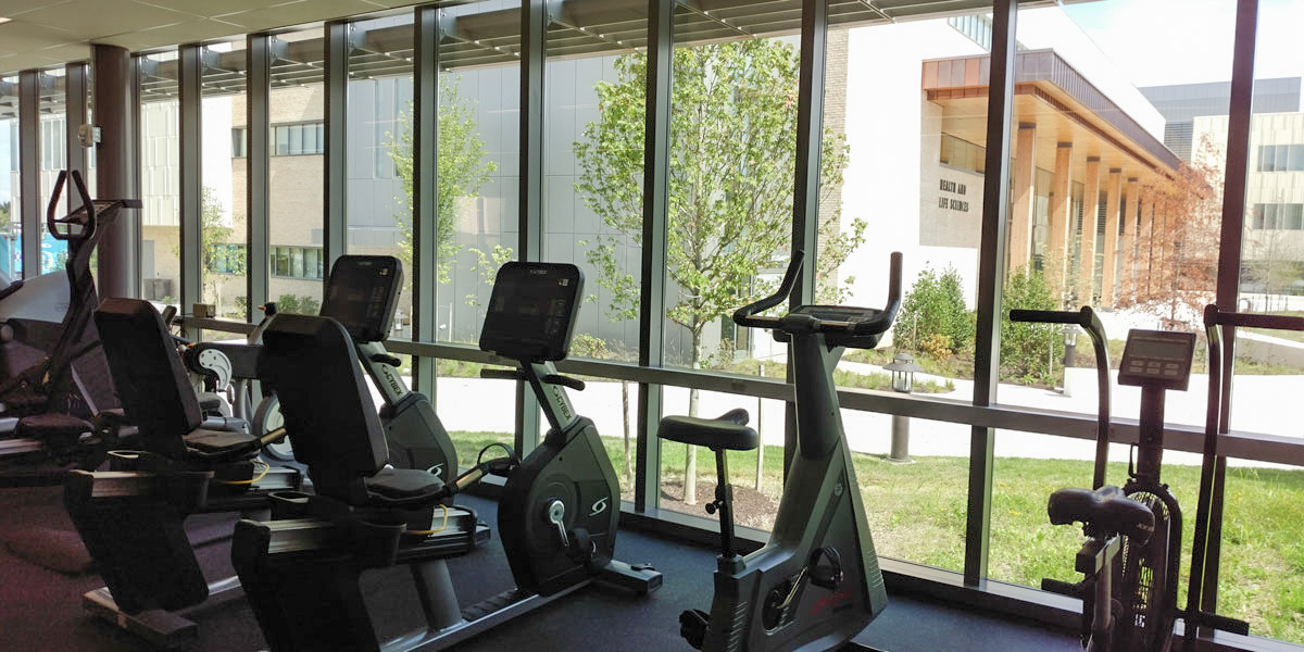 Exercise machines inside the fitness center at AACC.