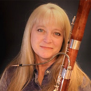 Headshot of Kari Shea with her bassoon