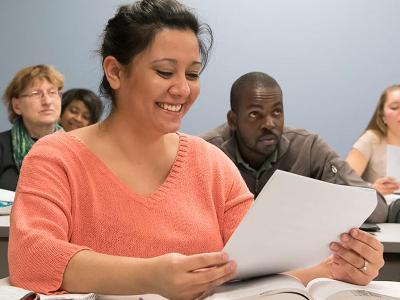 AACC student reviews a classroom handout.