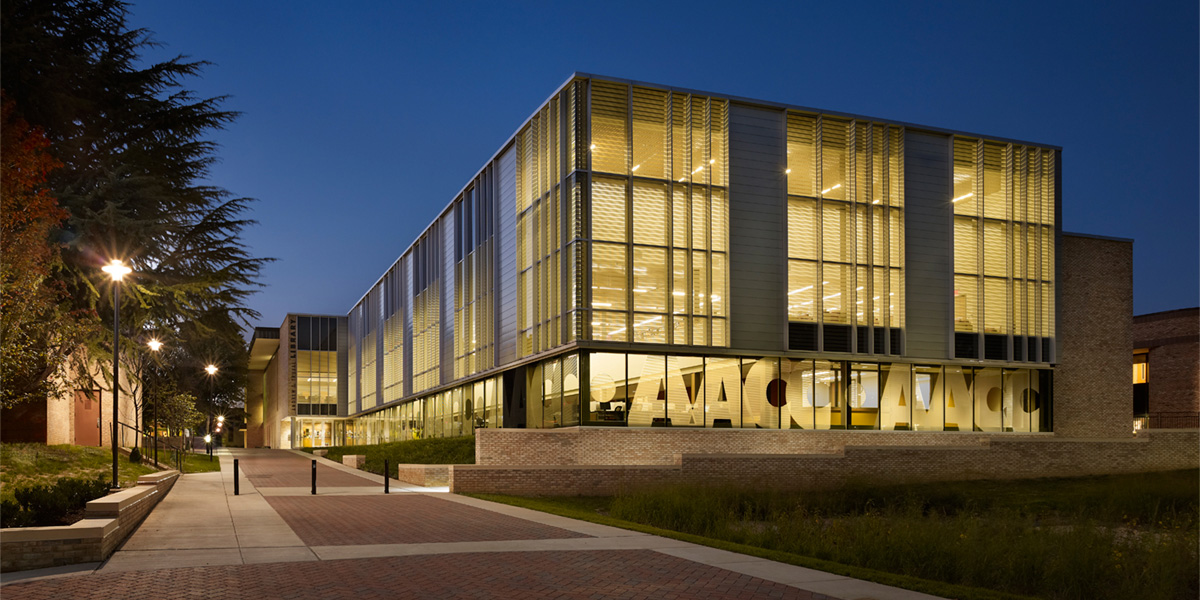 Exterior of AACC's Truxal Library at night.