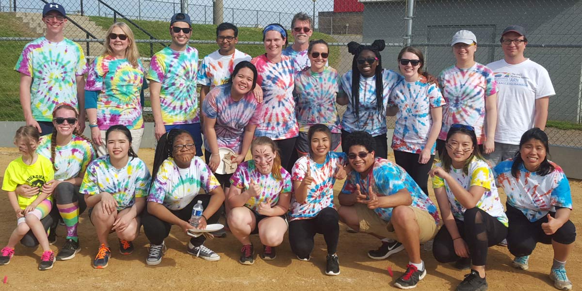 Group of student ambassadors wearing tie dye t-shirts