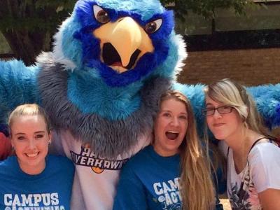 Students pose with Swoop on the quad.